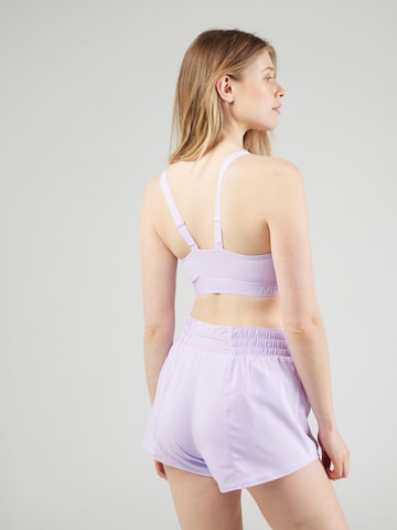 Bustier Soutien-gorge de sport 'INDY' NIKE en violet