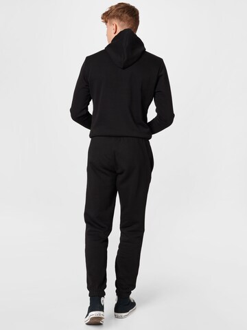 Tapered Pantaloni di NEW ERA in nero