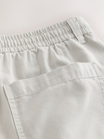 Next Loose fit Pleat-front trousers in Beige