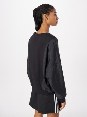 ADIDAS ORIGINALS Sweatshirt 'Premium Essentials Nylon Hybrid' in Schwarz