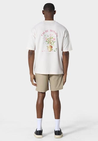 T-Shirt 'Pot De Vie' Pas De Monaco en blanc
