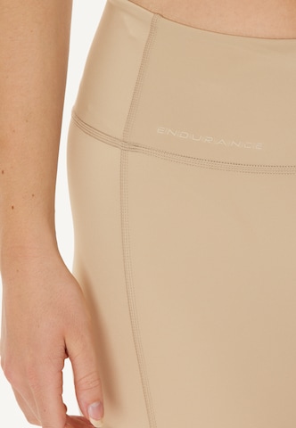 ENDURANCE Skinny Urheiluhousut 'Thadea' värissä beige