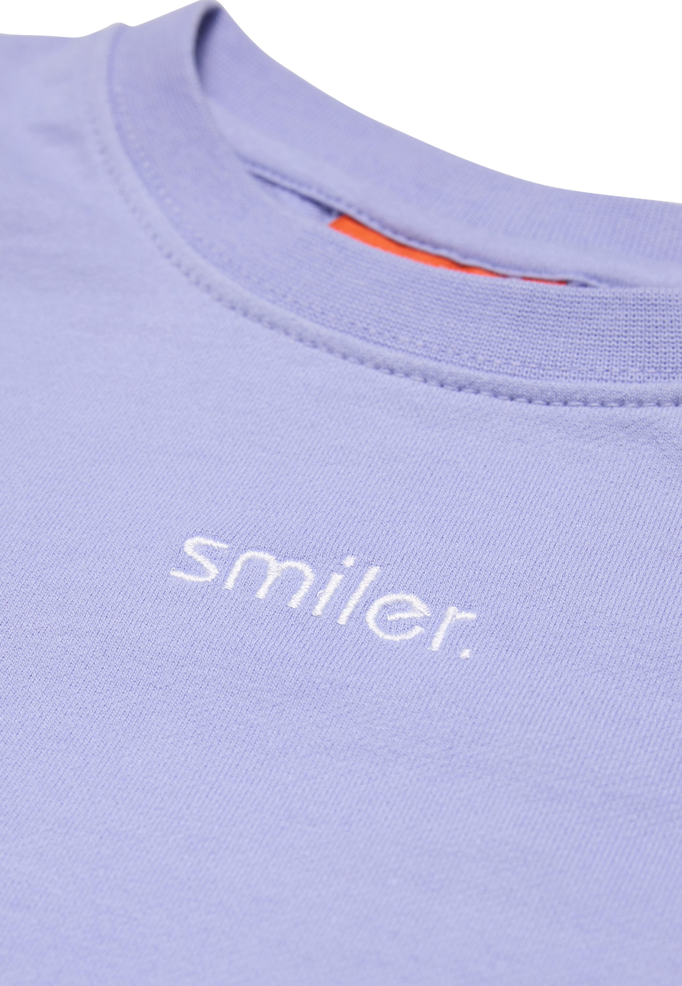 T-Shirt smiler. en violet