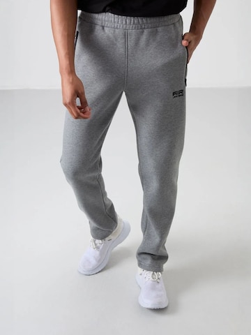 Tommy Life Szabványos Sportnadrágok 'Jogginghose' - szürke