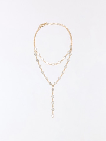 Chaîne Bershka en or : devant