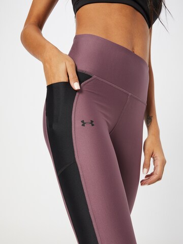 Skinny Pantalon de sport UNDER ARMOUR en violet