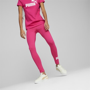 PUMA Skinny Sports trousers in Pink