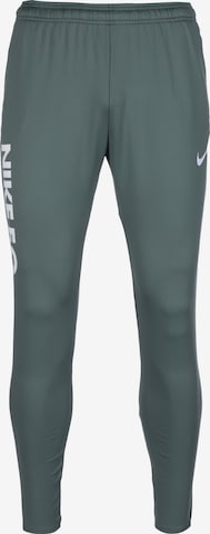 Slimfit Pantaloni sportivi di NIKE in verde: frontale