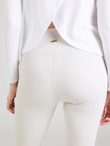 Athlecia Skinny Sports trousers 'Aliya' in Grey