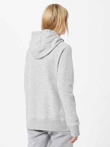 UNDER ARMOUR - Sweatshirt de desporto em cinzento