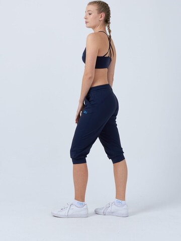 SPORTKIND Loosefit Sportbroek 'Caprihose mit Taschen' in Blauw