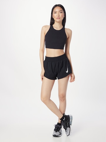 NIKE Loose fit Workout Pants 'Swoosh' in Black