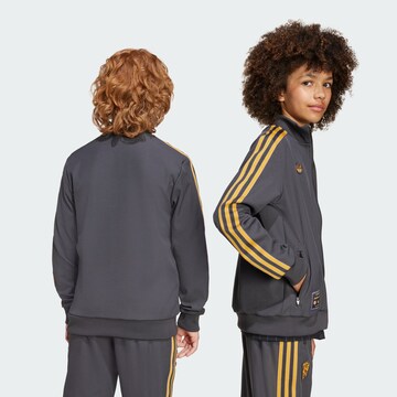 Veste mi-saison 'Manchester United Terrace Icons' ADIDAS ORIGINALS en noir