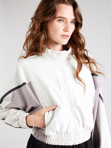 UNDER ARMOUR Sports jacket 'Unstoppable' in White