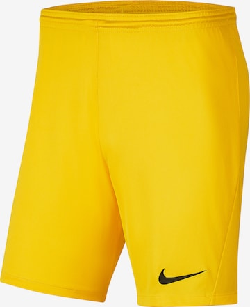 NIKE Regular Workout Pants in Yellow: front