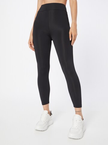 Skinny Pantalon de sport 'Enie' ABOUT YOU en noir : devant