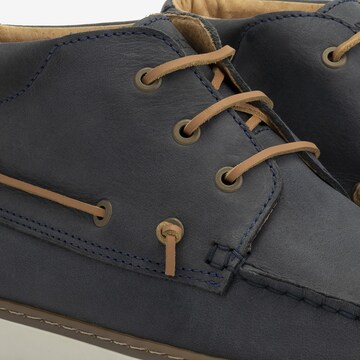Travelin Lace-Up Boots in Blue