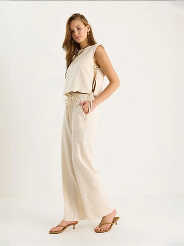 Bianco Lucci - Calças de fato em bege