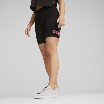 PUMA Skinny Workout Pants in Black: front