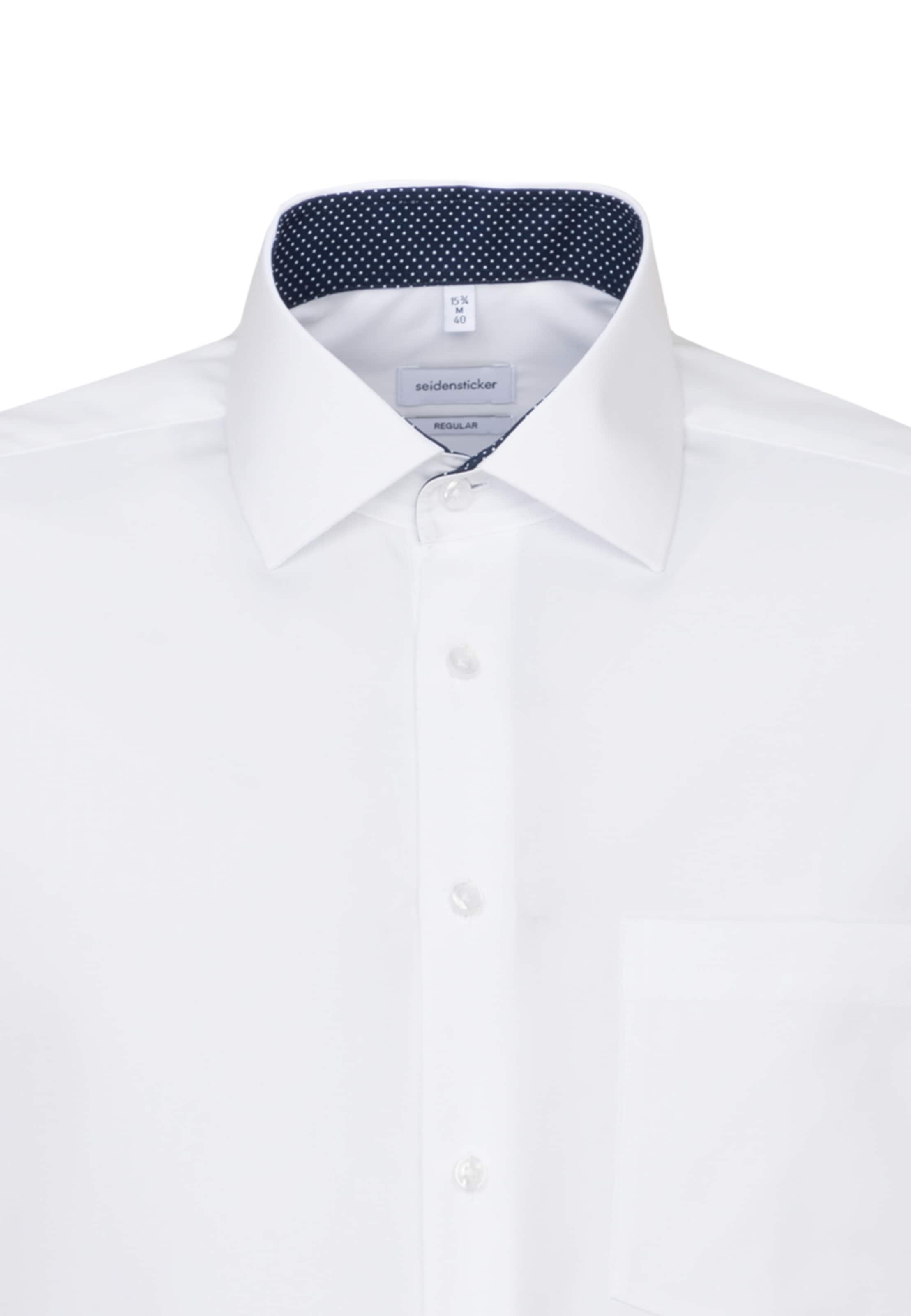 Coupe regular Chemise business ' Regular ' SEIDENSTICKER en blanc