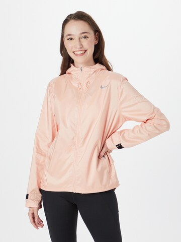 Veste de sport NIKE en rose : devant