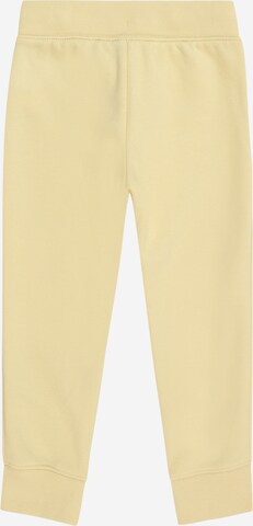 GAP - Tapered Pantalón en amarillo