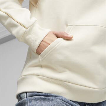PUMASportska sweater majica 'ESS+' - bež boja