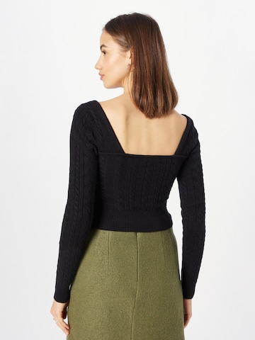 The Frolic Pullover in Schwarz