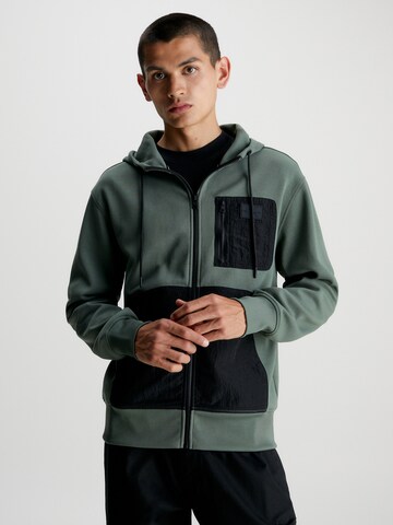 Calvin Klein Jeans Zip-Up Hoodie in Green: front