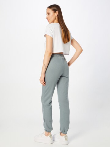 ELLESSE Tapered Broek 'Viction' in Groen