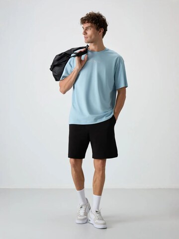 Tommy Life T-Shirts in Blau
