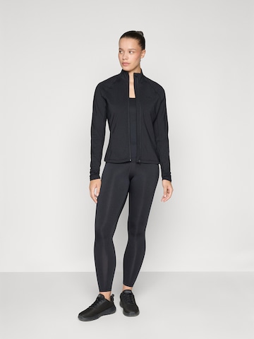 Skinny Pantalon de sport Reebok en noir