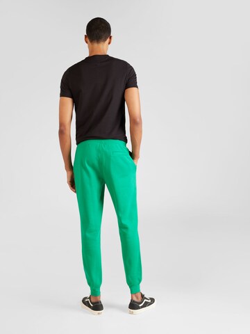 TOMMY HILFIGER Tapered Broek in Groen