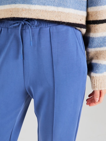 s.Oliver Tapered Trousers in Blue