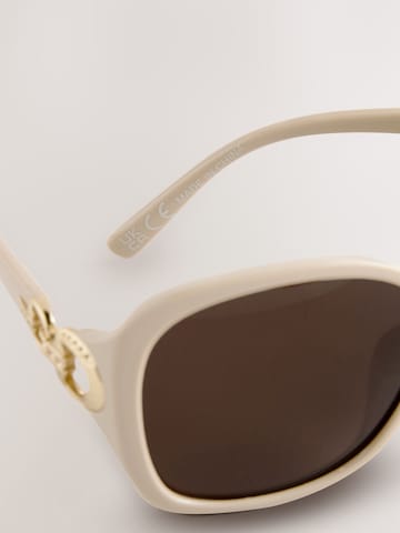 Lunettes de soleil Next en beige