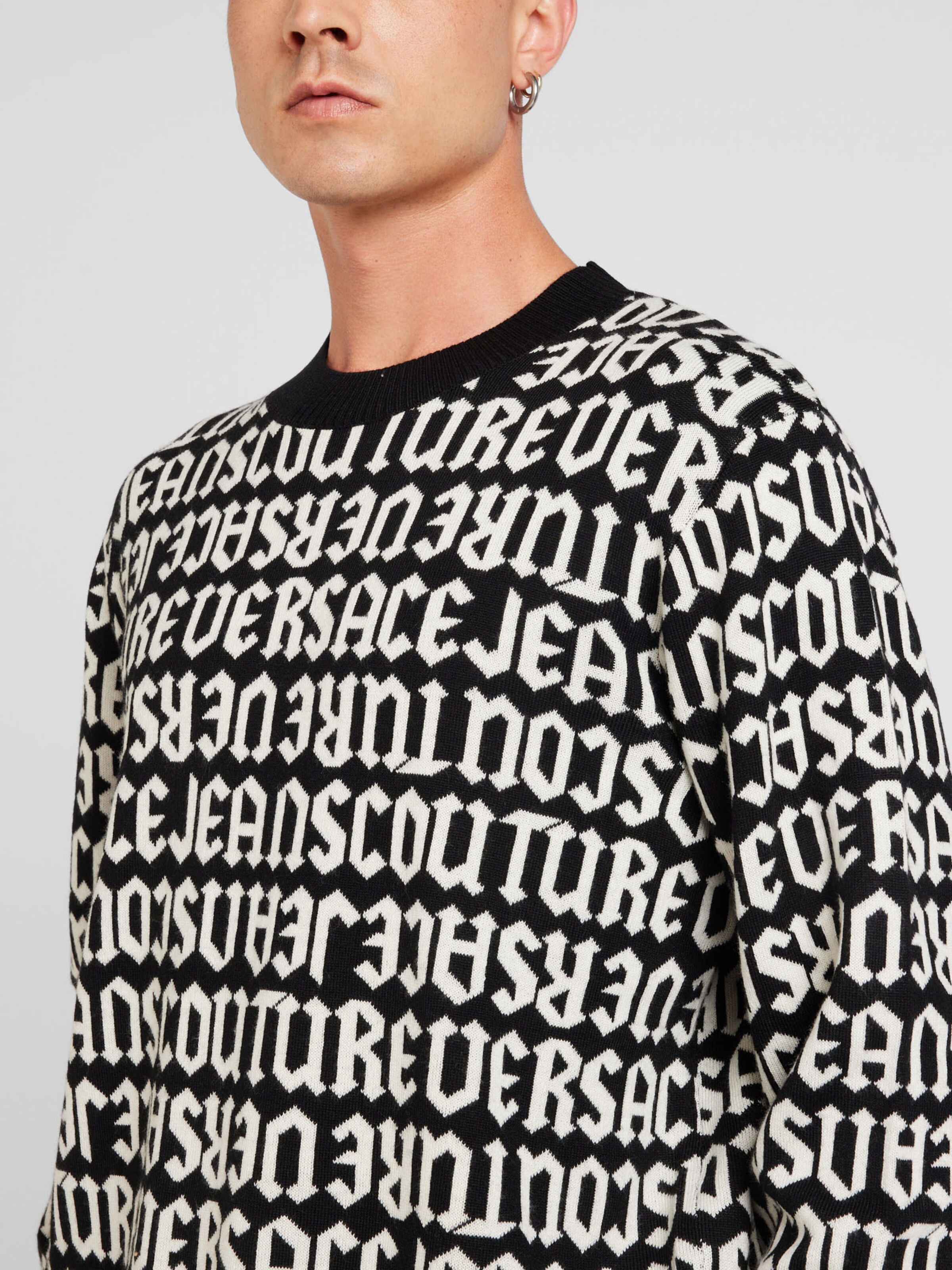 Pull over Versace Jeans Couture en Noir ABOUT YOU