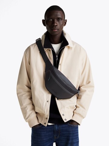 TOMMY HILFIGER Belt bag in Black: front