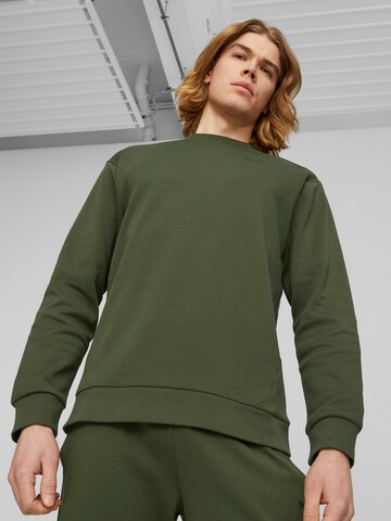 PUMA Sports sweatshirt in Green: front