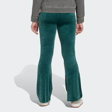 ADIDAS ORIGINALS Flared Trousers in Green