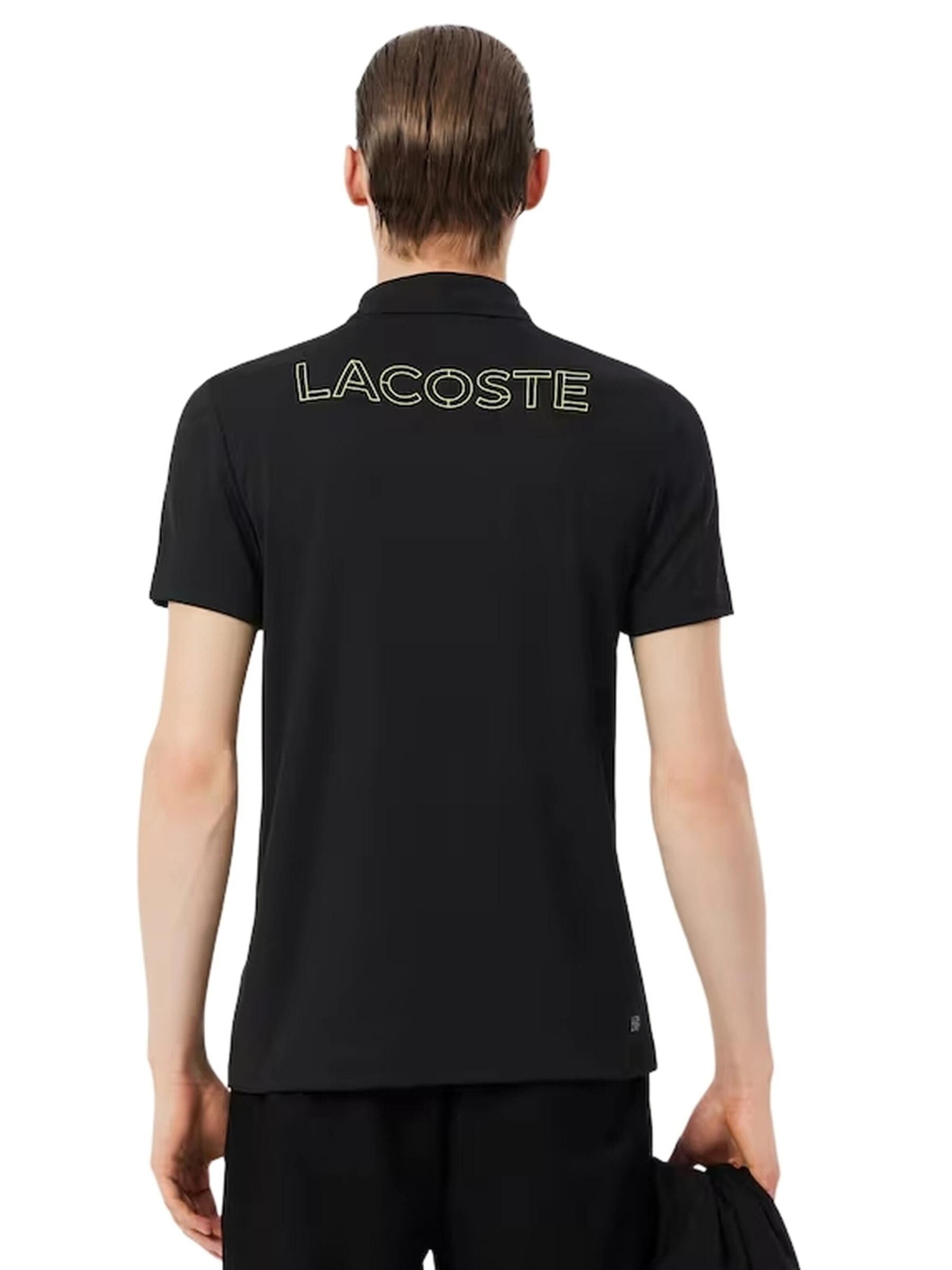 LACOSTE - Camiseta 'Polo lacoste negro back logo ultra dry polo shirt' en negro