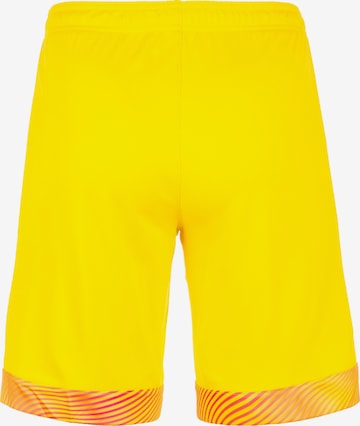 PUMA Regular Workout Pants 'Cup' in Yellow