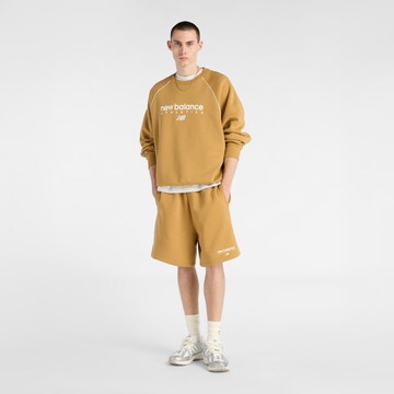 Sweat-shirt 'Trackside' new balance en jaune