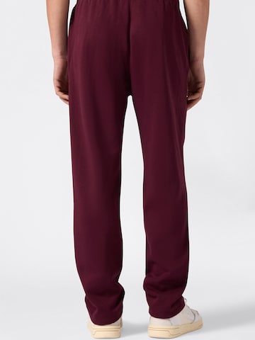 Champion Authentic Athletic Apparel Regular Housut värissä punainen