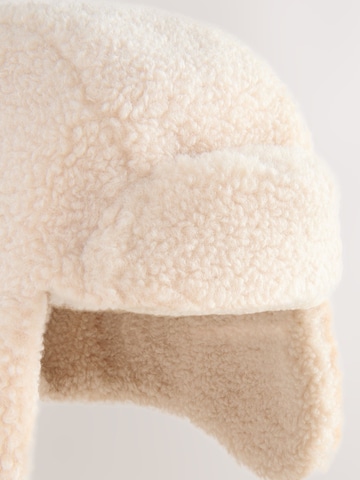 Bonnet Next en beige