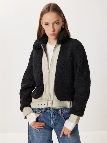 Happiness İstanbul Between-season jacket in Black: front