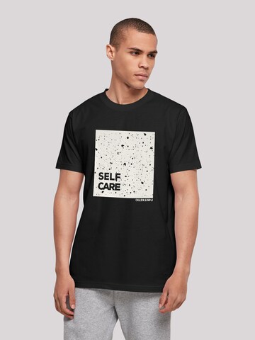 F4NT4STIC Shirt 'SELF CARE' in Zwart: voorkant