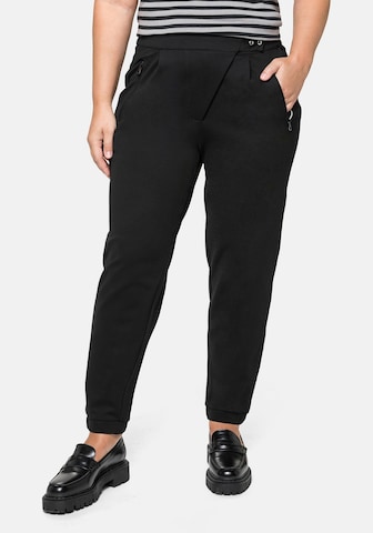 SHEEGO Tapered Pleat-Front Pants in Black: front