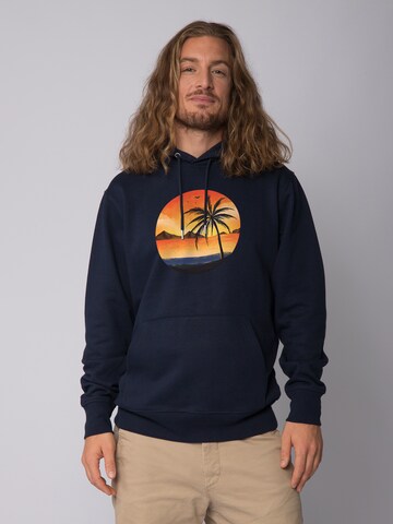Sweat-shirt ' Sunset on palm beach ' Watapparel en bleu : devant
