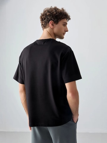 Tommy Life T-Shirts in Schwarz
