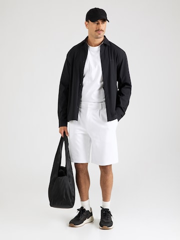BOSS - Loosefit Pantalón deportivo en blanco